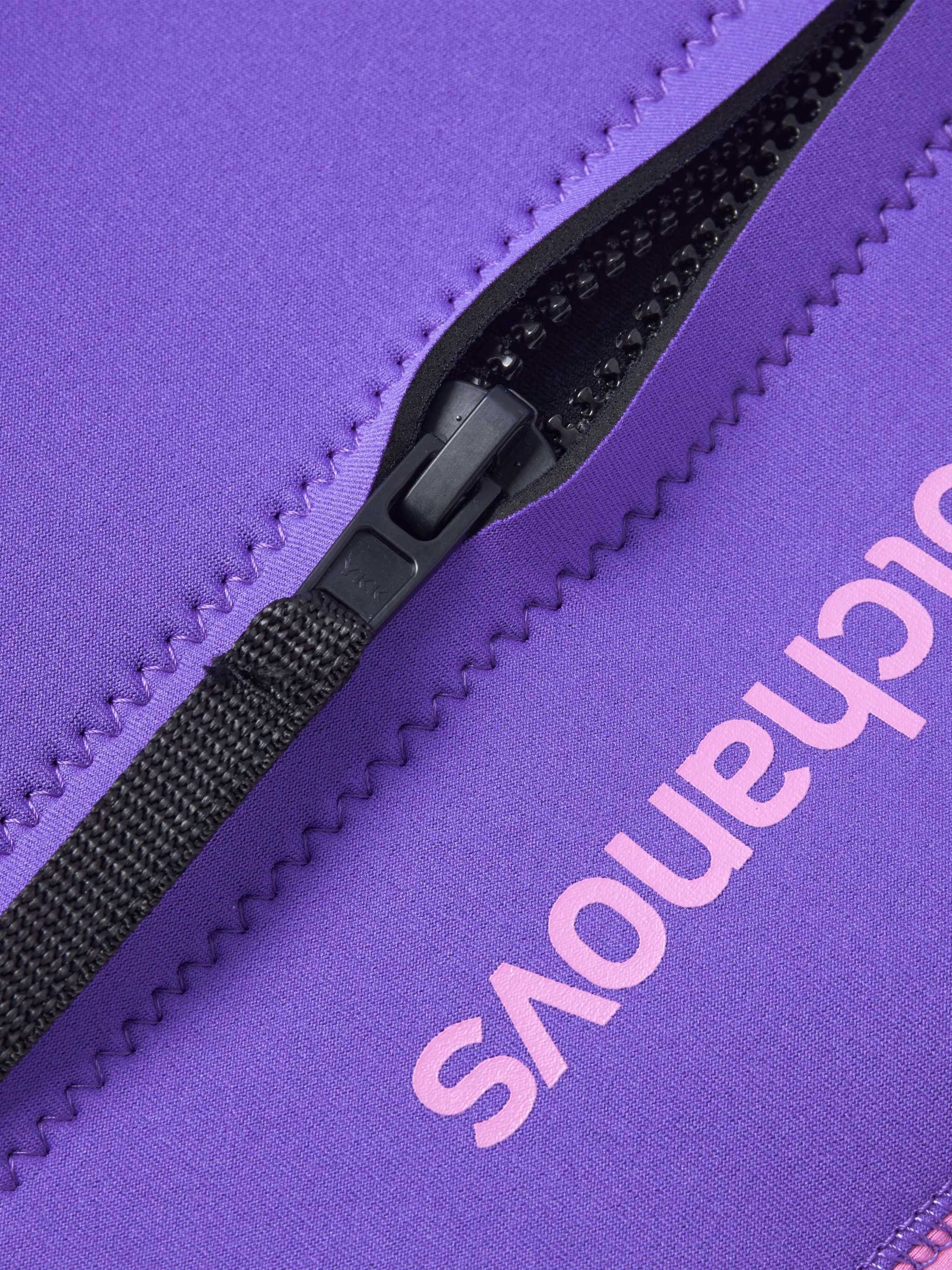 Close up showing the zipper on the Molchanovs one-piece kids wetsuit.