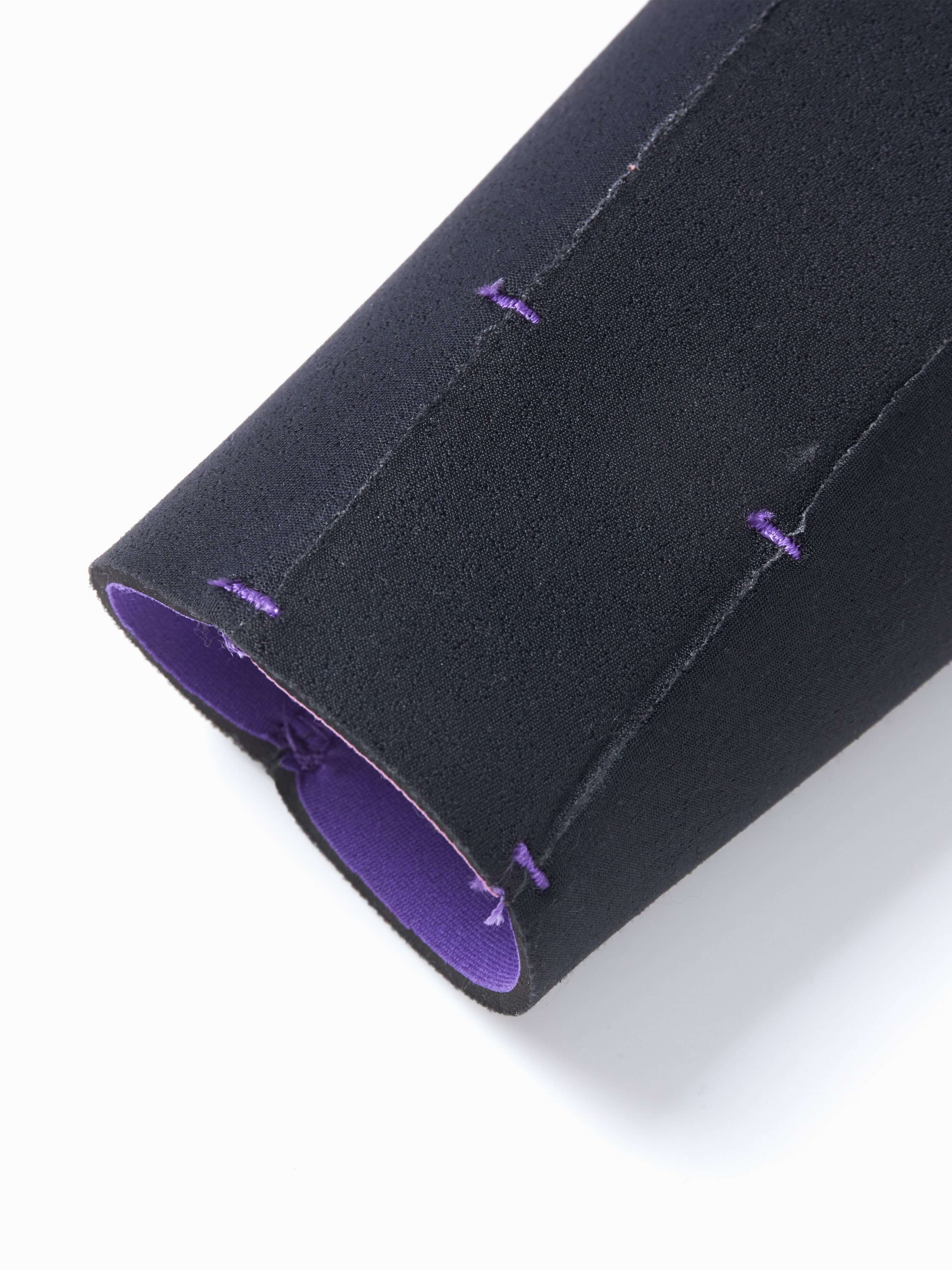 Close up of the quality of neoprene glueing on Molchanovs childrens 2.5mm wetsuit.