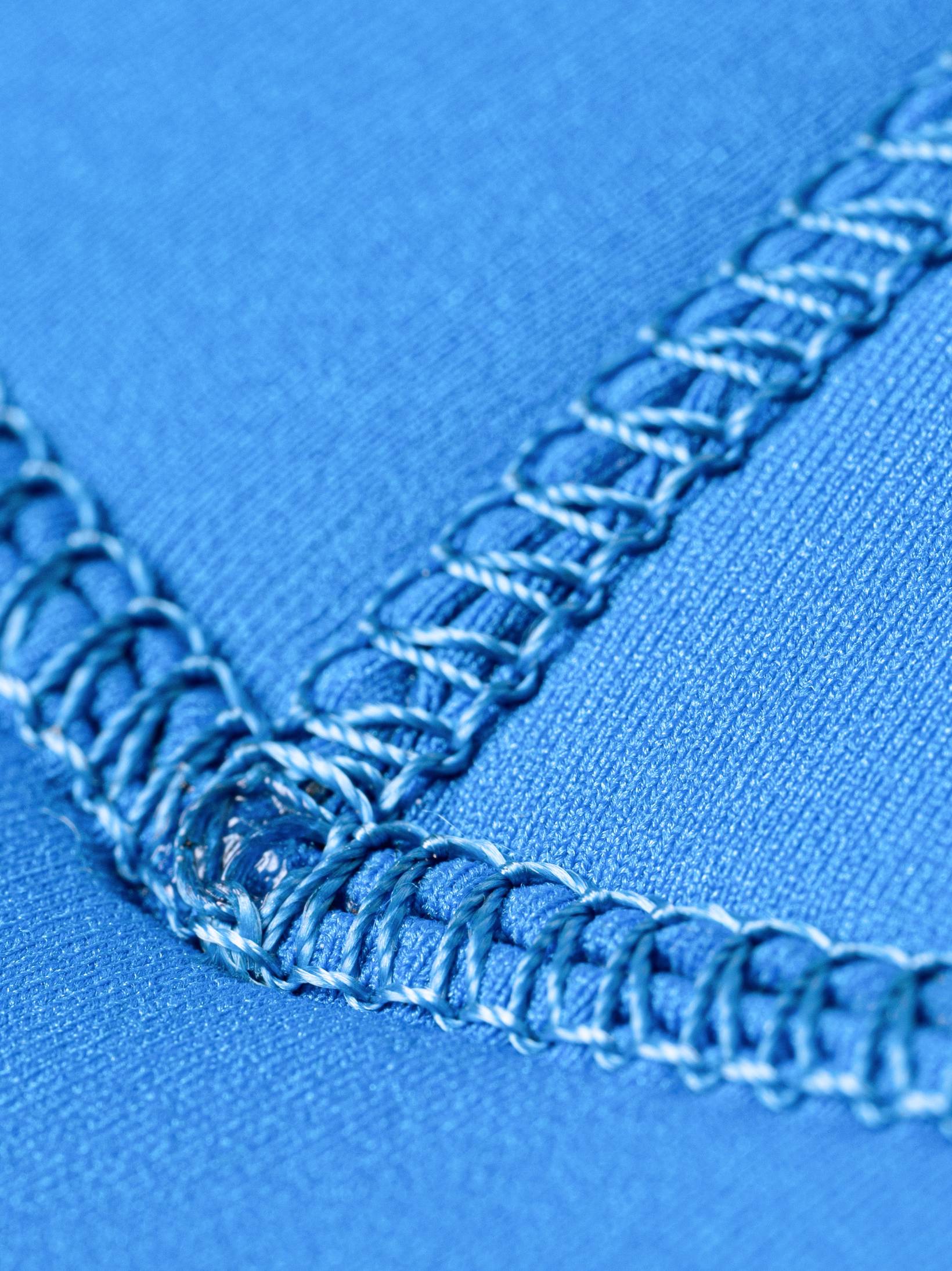 Exterior stitching and joins on the double lined mens freediving wetsuit