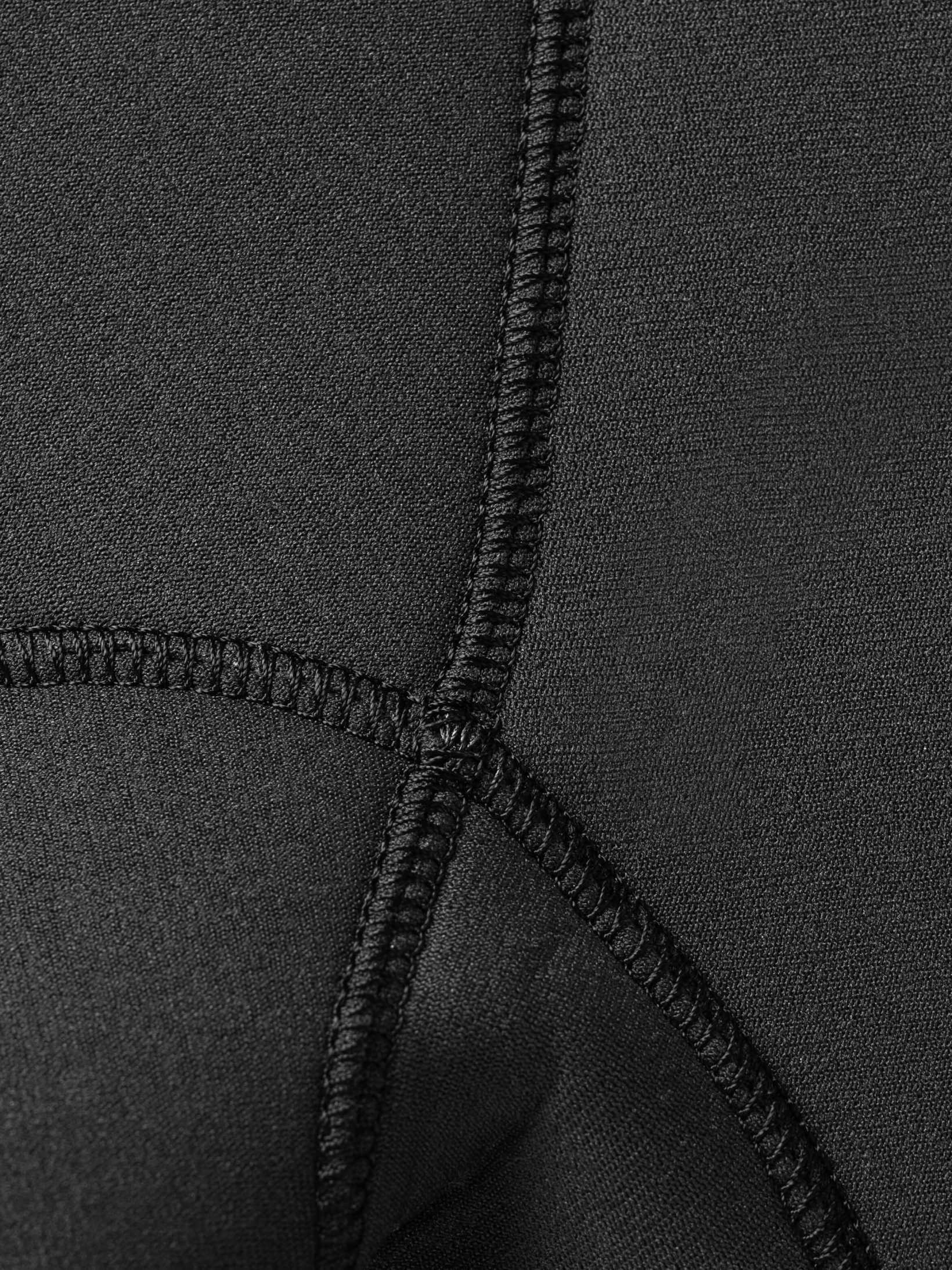 Close up of the quality craftsmanship and durabel stitching that holds this double lined mens suit together
