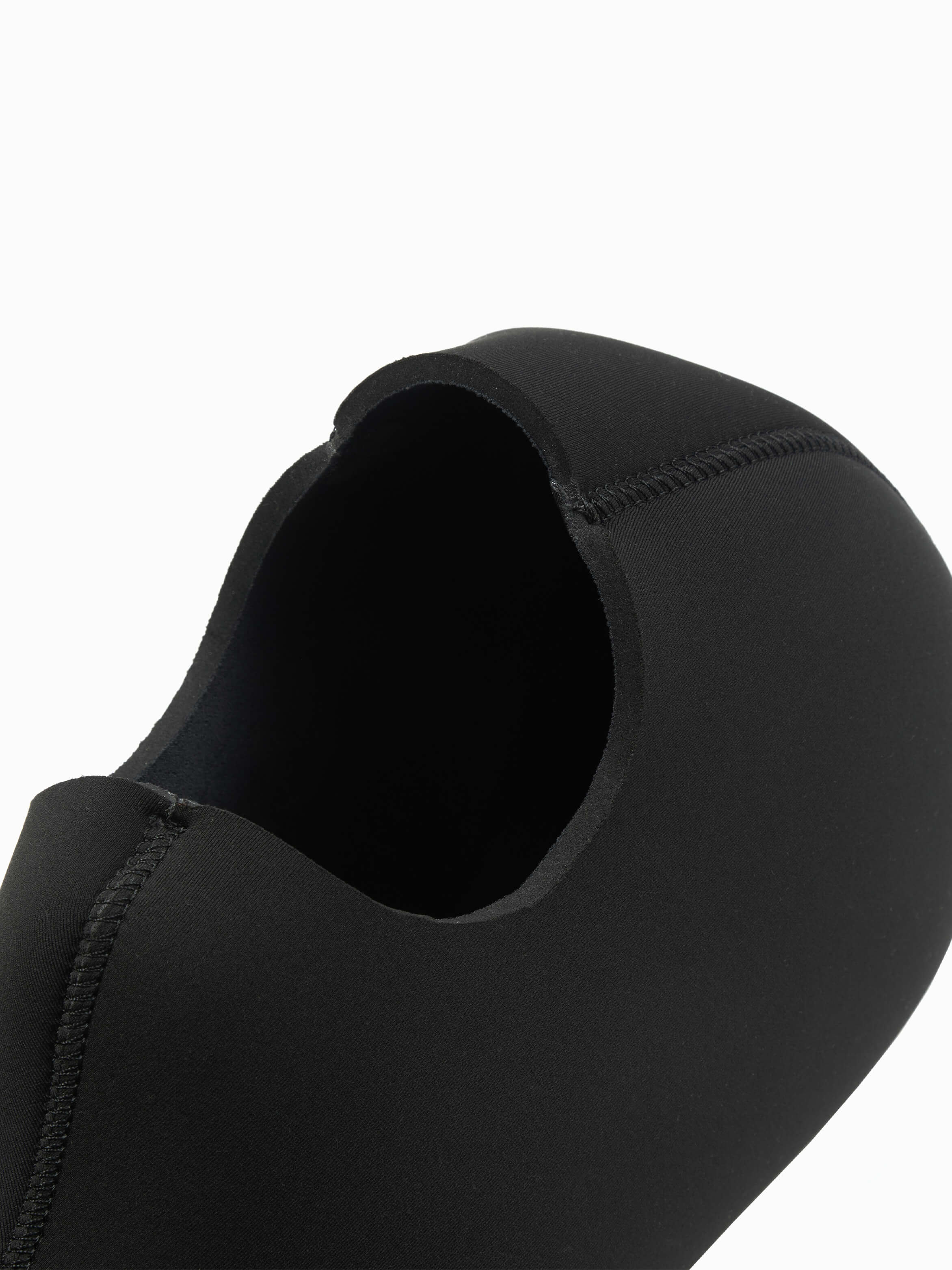 Close up of the 5mm mens wetsuit. Double lined for durability. You can see the cut of the neoprene around the face and the pannels that shape the hood. 